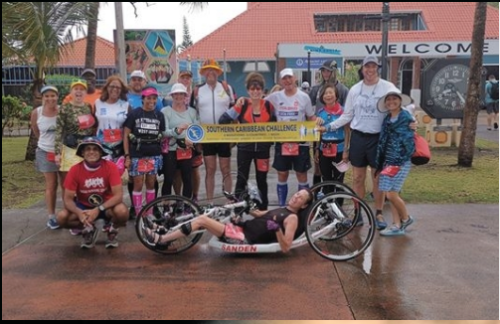 Fastest aggregate time for 12 Marathons on 12 different Caribbean Islands via Handcycle (female).Elizabeth Sanden.
