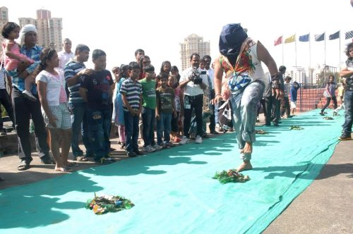 BLINFOLDED 100 METERS WALKING WITH GLASS OBSTACLES AND BROKEN NAILS