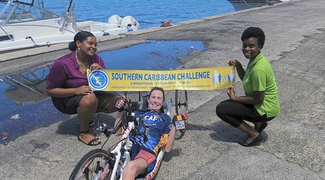Fastest aggregate time for 12 Marathons on 12 different Caribbean Islands via Handcycle (female).Elizabeth Sanden.