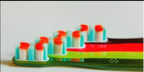 Toothbrush with the stiffest implanted tapered hair